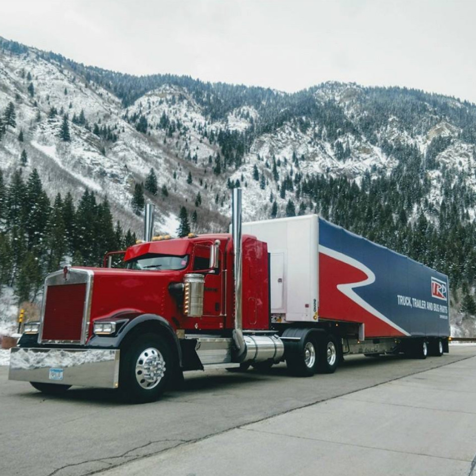 Truck 344 transporting general freight through the mountains in Utah.