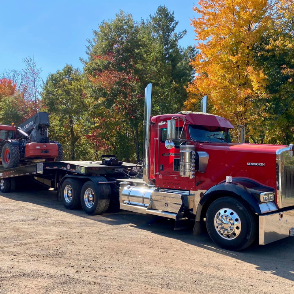 Lefbulk hauling machinery equipment in Elk River Minnesota during a sunny fall day.